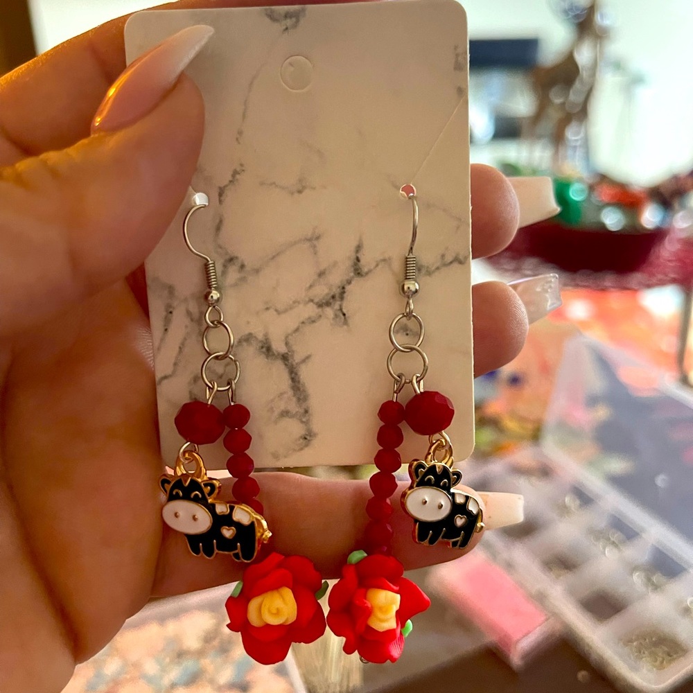 Dangle cow earrings
